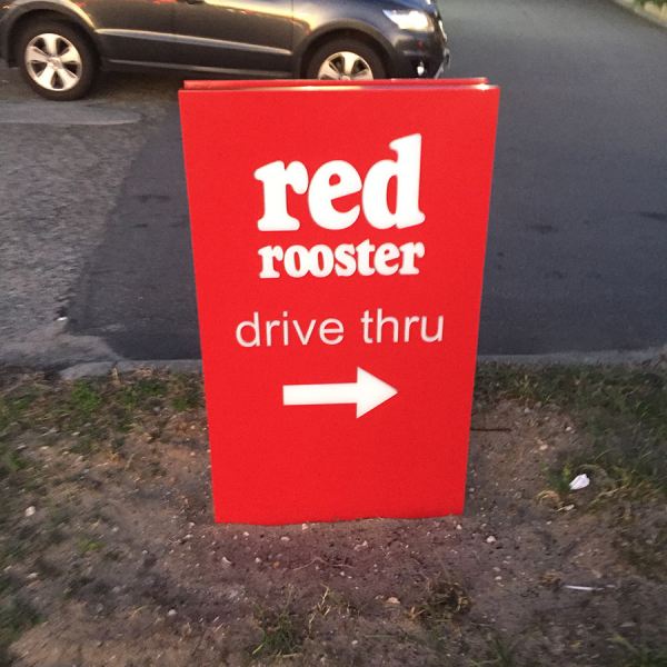 red rooster monument sign